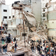 Rescue workers search for survivors and victims of the AMIA bombing in 1994.